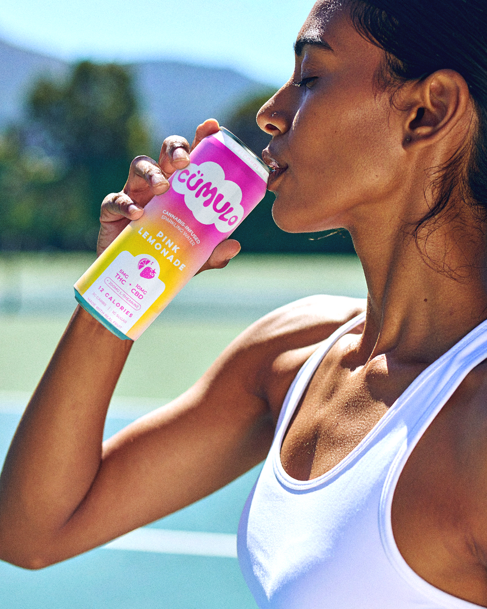 Woman drinking wellness drink
